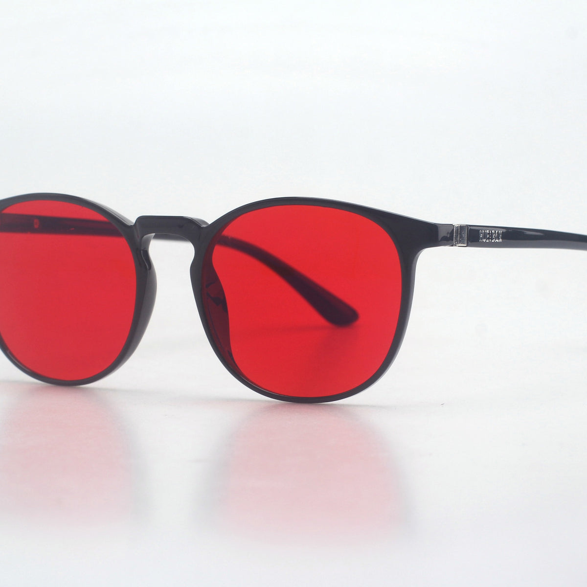 Hueban SR Prism — black round frame with red lens